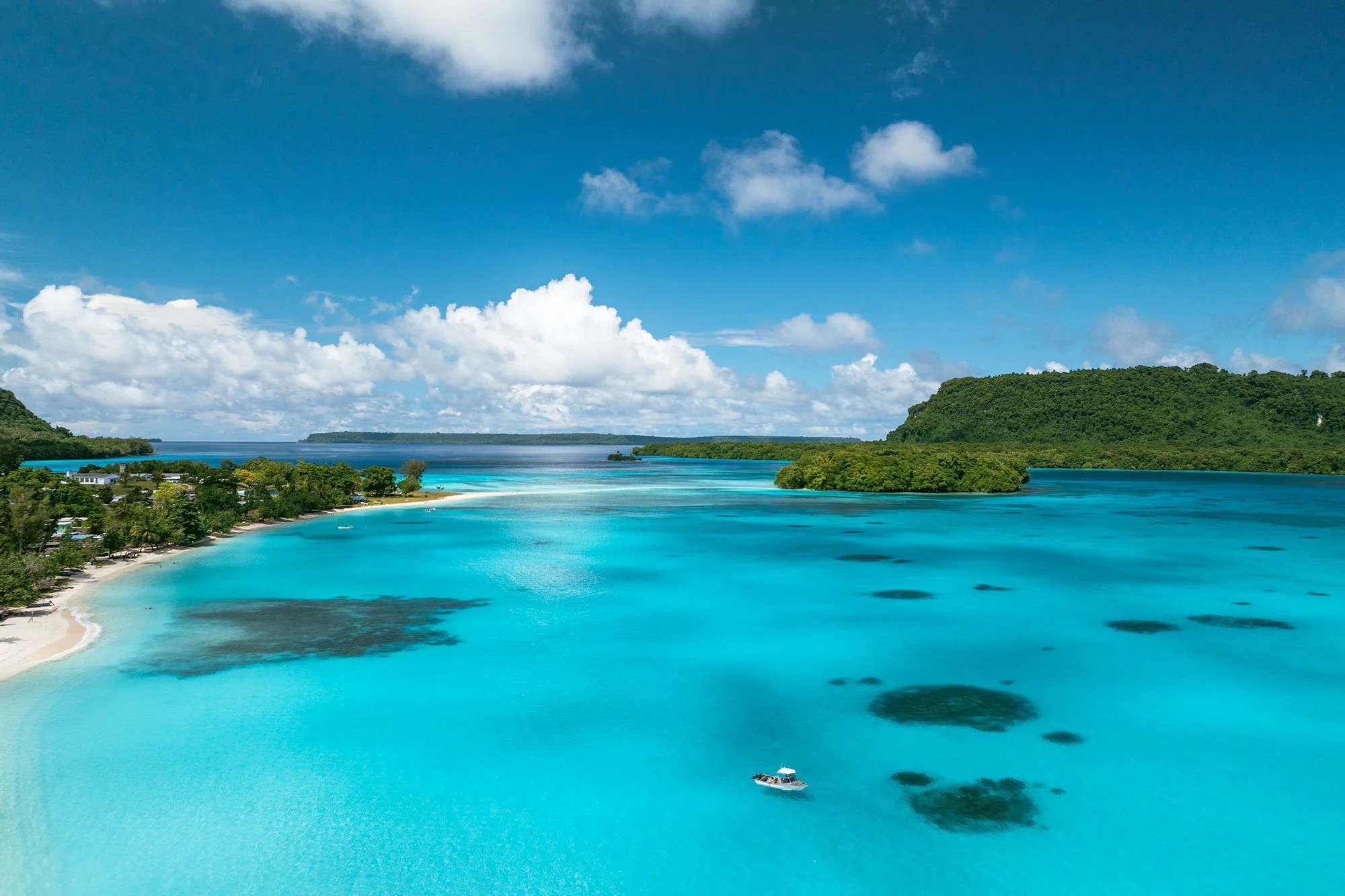 Turquoise lagoon and white sand beach in Vanuatu